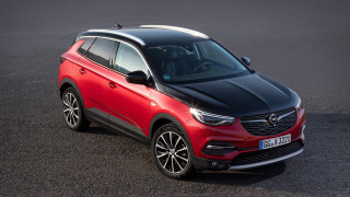 Red opel suv parking black - roof free wallpaper