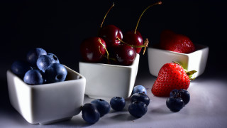 Bowl cherries blueberries strawberry table - food photography free wallpaper