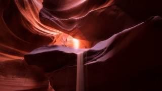 Narrow canyon stream light end - volumetric light free wallpaper