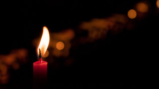 Candle red flame dark blurry - a candle free wallpaper