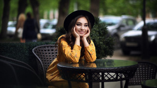 Woman smiling park hat portrait - a woman sitting free wallpaper
