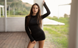 Woman black dress wall fashion 2 - a black dress leaning against a wall free wallpaper