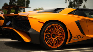 Orange sports car 3d render - the background and a sky background free wallpaper
