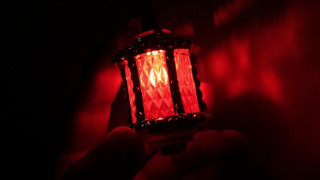 Red light holding portrait rembrandt - a hand free wallpaper for desktop