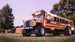 Schoolbus huge tires field trees - a red roof free wallpaper