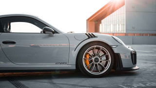 White sports car parking lot 31 - romanesque free wallpaper for desktop