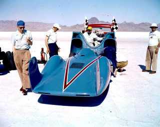 Race car men desert mountains - a blue race car free wallpaper