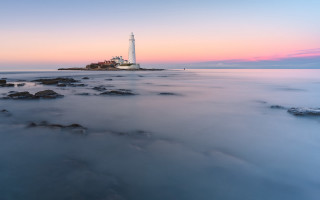 Lighthouse rocky shore sunset clouds 13 - a rocky shore free wallpaper for desktop