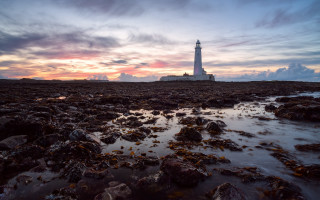 Lighthouse rocky shore sunset clouds 17 - adobe lightroom free wallpaper