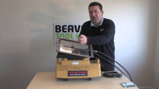 Man holding tool box table - a cord free wallpaper