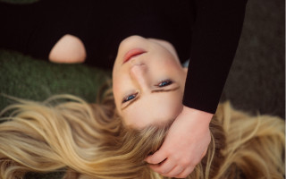 Blonde woman laying illusion portrait - optical free wallpaper for desktop