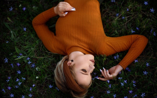 Woman laying cigarette flower nature - her mouth and a cigarette free wallpaper
