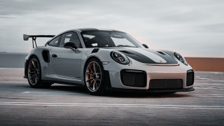 White black porsche sports car - a parking lot free wallpaper