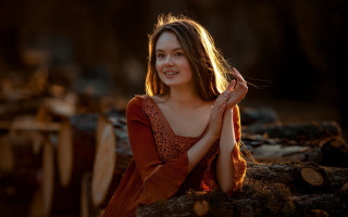Woman smiling forest red dress - in a forest free wallpaper