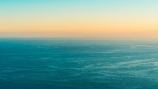 Ocean plane sunset minimalism tiltshift - over the water free wallpaper