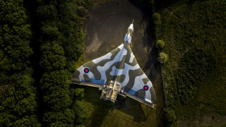 Camouflaged jet tiltshift forest reddot - barron storey free wallpaper for desktop