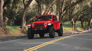 Red jeep forest road sunny - a red jeep free wallpaper