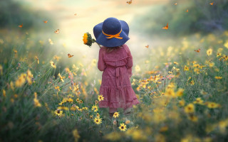 Little girl flower field butterfly - her head and a butterfly free wallpaper