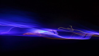 Blurry person red light abstract - a red light in the middle of the image free wallpaper