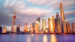 City skyline river bridge eastern - a body of water in front free wallpaper