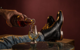 Man pouring whiskey glass vase - a shoe free wallpaper