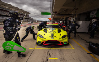 Yellow race car pit crew - a yellow race car free wallpaper