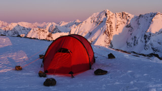 Snowy mountain tent sunset reflection - a tent free wallpaper