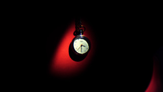 Clock glowing red shadow person - a shadow of a person free wallpaper