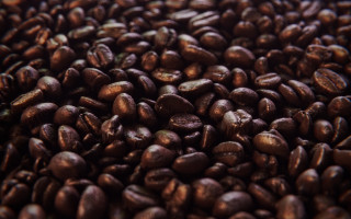 Coffee beans closeup black background - coffee bean free wallpaper