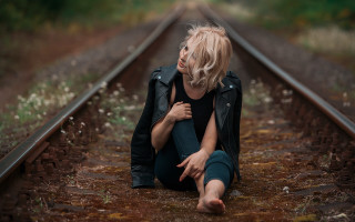 Woman sitting train track blonde - a train track free wallpaper
