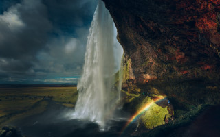 Waterfall rainbow darksky clouds mountains - a dark sky above free wallpaper