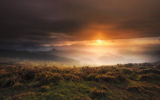 Sunset field clouds mountains ocean - atmospheric free wallpaper
