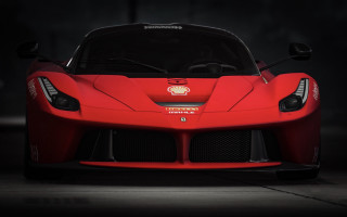 Red sports car dark room 96 - the front of the car free wallpaper for desktop