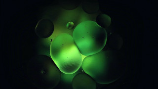 Glowing green bubbles holography microscopic - bubble free wallpaper for desktop