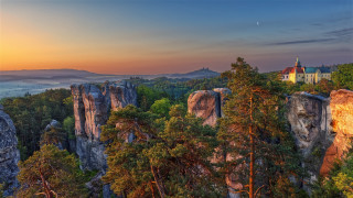 Mountain church sunset fog valley - a scenic view of a mountain free wallpaper