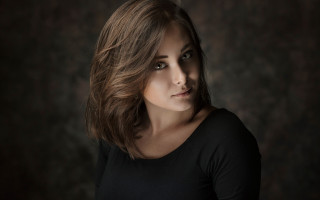 Woman black shirt black background 3 - free portrait wallpaper for desktop
