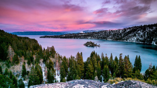 Lake mountain trees pink sky - a small island in the middle free wallpaper