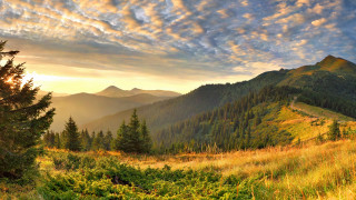 Mountain sunset clouds naturalism autumn - a scenic view of a mountain range free wallpaper