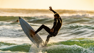 Surfing man wave ocean sunset - in the ocean free wallpaper