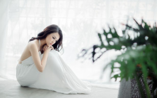 Woman white dress sitting plant 3 - the floor next free wallpaper