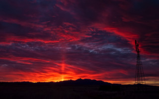 Red sky windmill mountain dusk - crepuscular ray free wallpaper