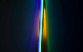 Tall light beam rainbow neon - a black background and a rainbow free wallpaper