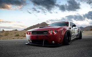Red sports car desert cloudy - the side of the road in the desert free wallpaper