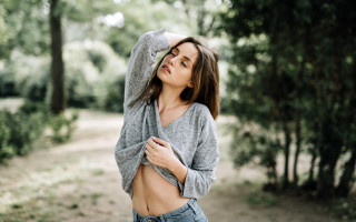 Woman open shirt forest bokeh - area free wallpaper