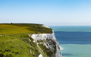 White cliff grassy field ocean - top of it next free wallpaper