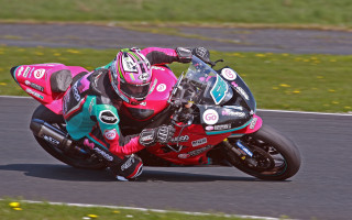 Motorcycle race track leaning helmet - grass free wallpaper