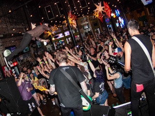 Crowd skateboard guitar man air - a renaissance painting free wallpaper