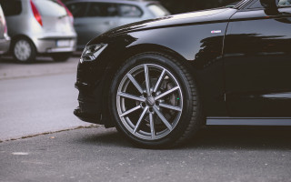 Black car parking meter red - the side of a road next free wallpaper