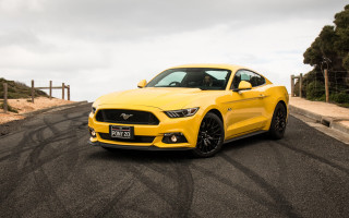 Yellow mustang tiltshift detailed outdoor - a cloudy sky free wallpaper for desktop