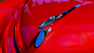 Red car chrome emblem black - fine detail free wallpaper
